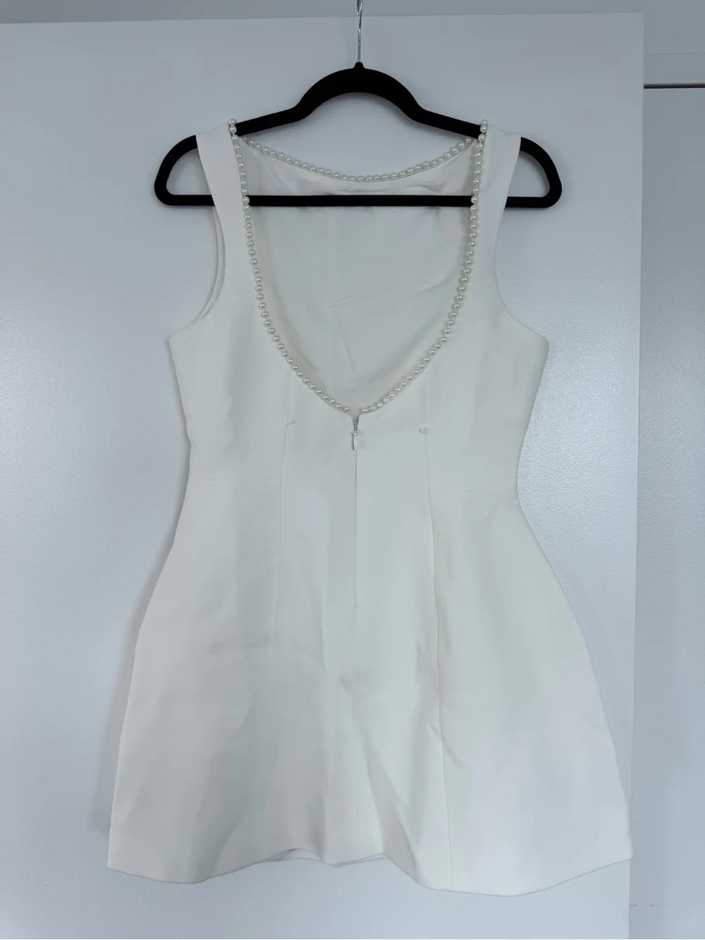 Elegant White Backless Mini Dress with Pearl-Trim Bow